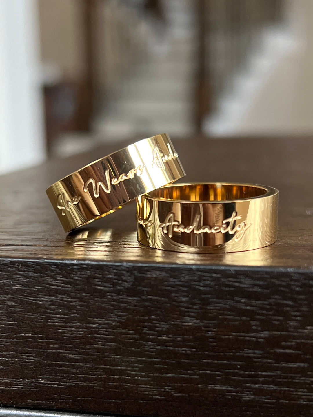 “She wears audacity” ring